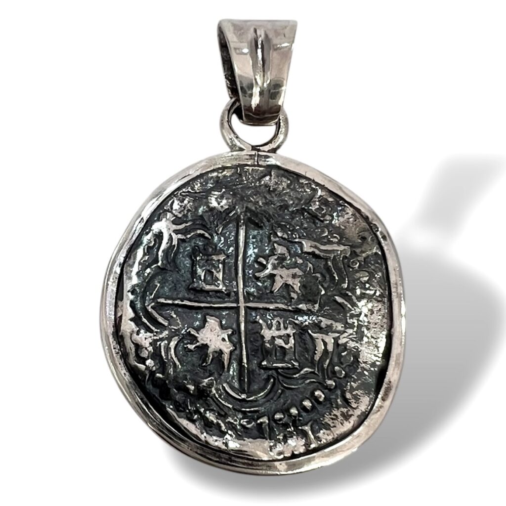 Dije de Macuquina de Plata.