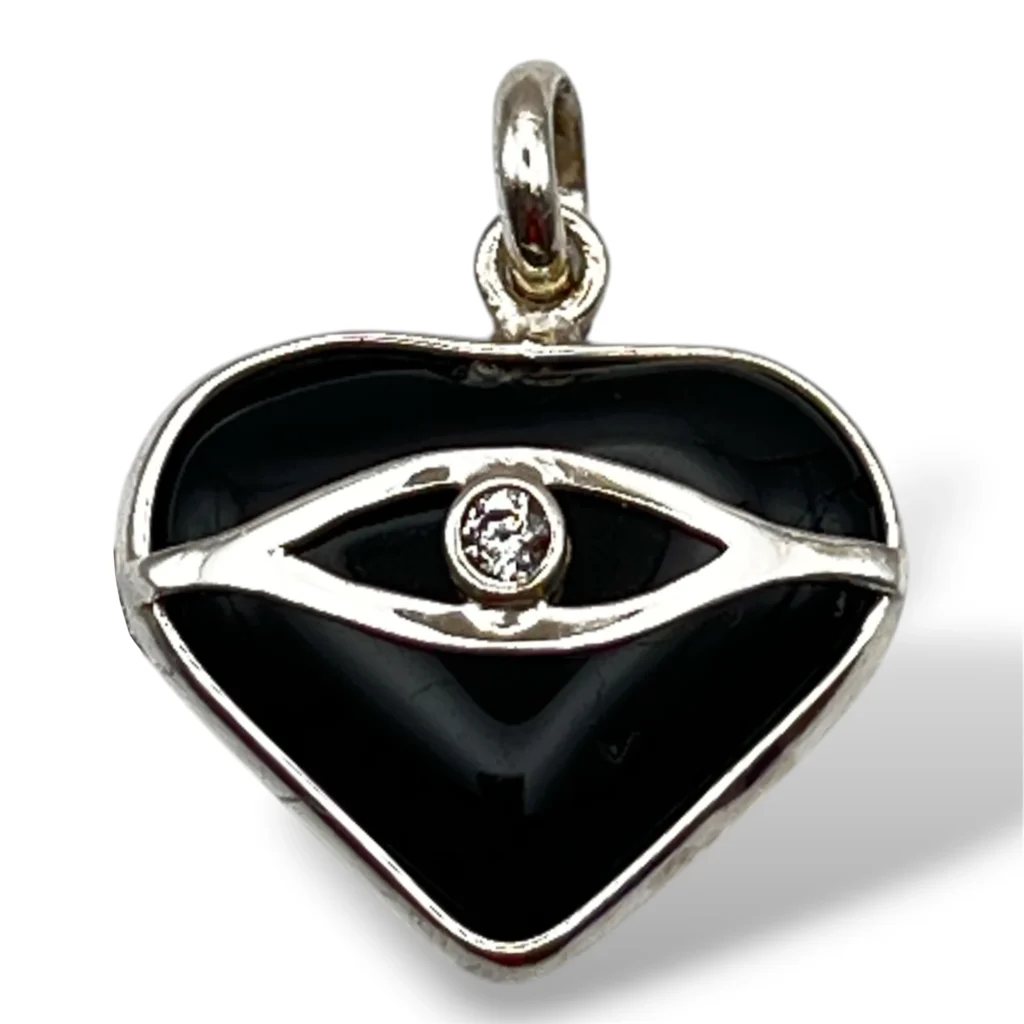 Dije de Plata con Turmalina Negra y Ojo Turco.