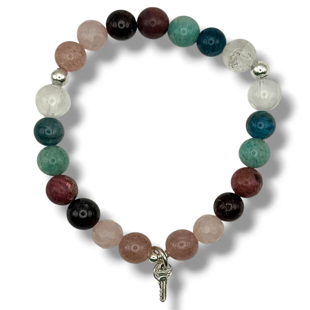 Pulsera de 7 Piedras Naturales y dije Llave de Plata.
